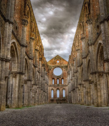 A ruined Monastery under a cloudy sky