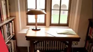 An old fashioned desk by a window