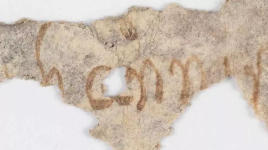 A scrap of material with writing on it