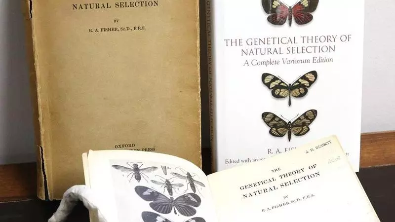 Three editions of The Genetical Theory of Natural Selection, published in 1930 (top-left), 1958 (bottom, open), and 1999 (top-right).