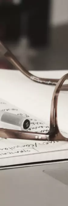 Glasses on an open notebook